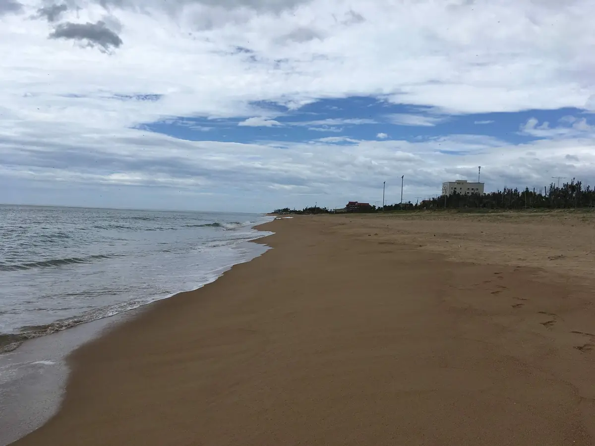 Wide sand and calm sea at a beach in Tuy Hoa